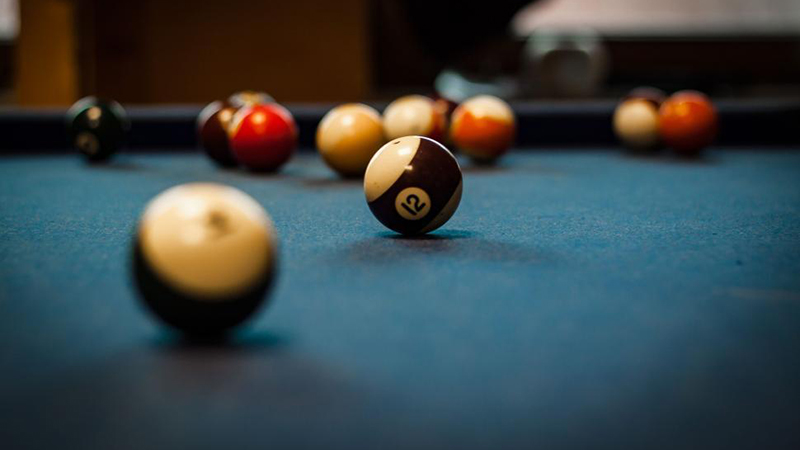 photo showing billiards balls on a table