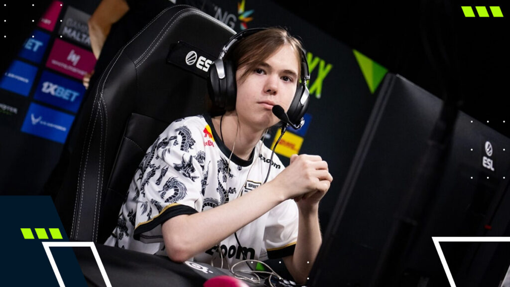 Donk wearing a headset on stage during a Counter-Strike 2 match