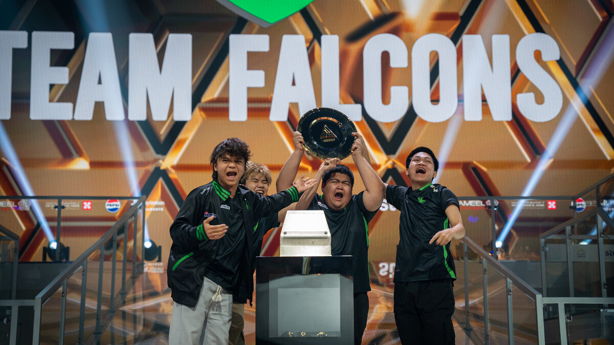 Team Falcons lifting the trophy at the Esports World Cup - Free Fire 2024