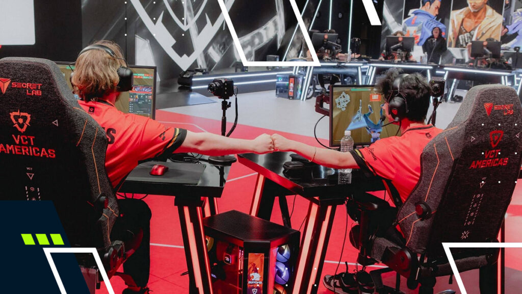 Two VCT Americas players fist bumping during a Valorant match