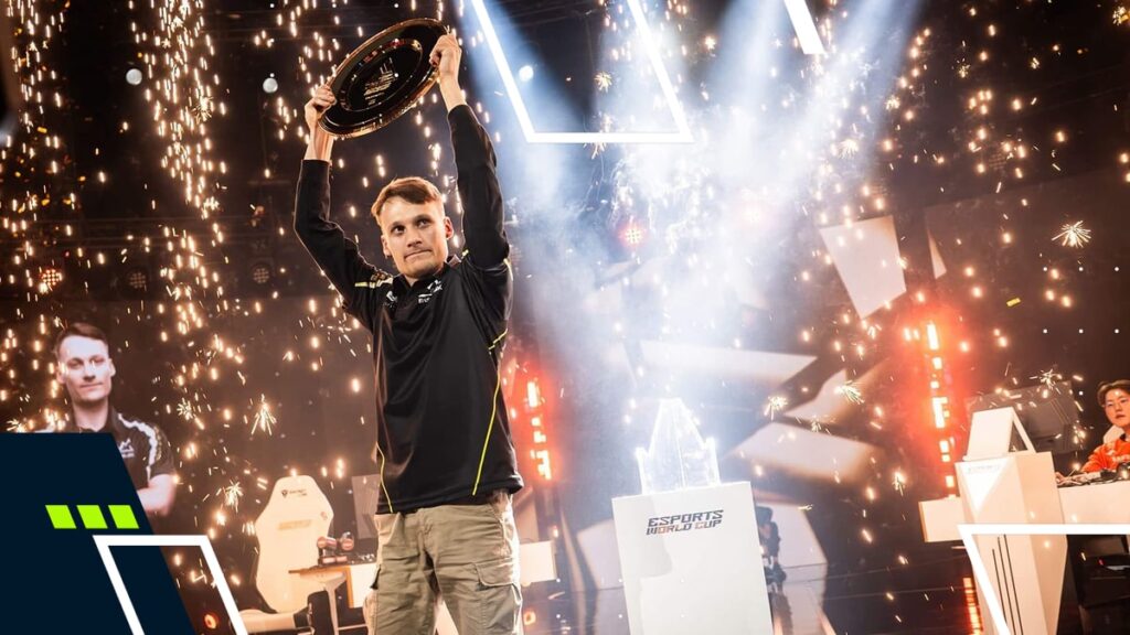 Serral lifting the trophy at the Esports World Cup 2025 StarCraft II Grand Final with sparks in the background