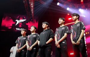 TALONon stage, all smiles after securing a 2-1 win over DRX