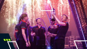 Gambit Esports celebrating on stage with the Masters trophy and fireworks