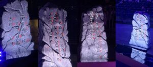 Stone pillars with glowing runes at The International 2025