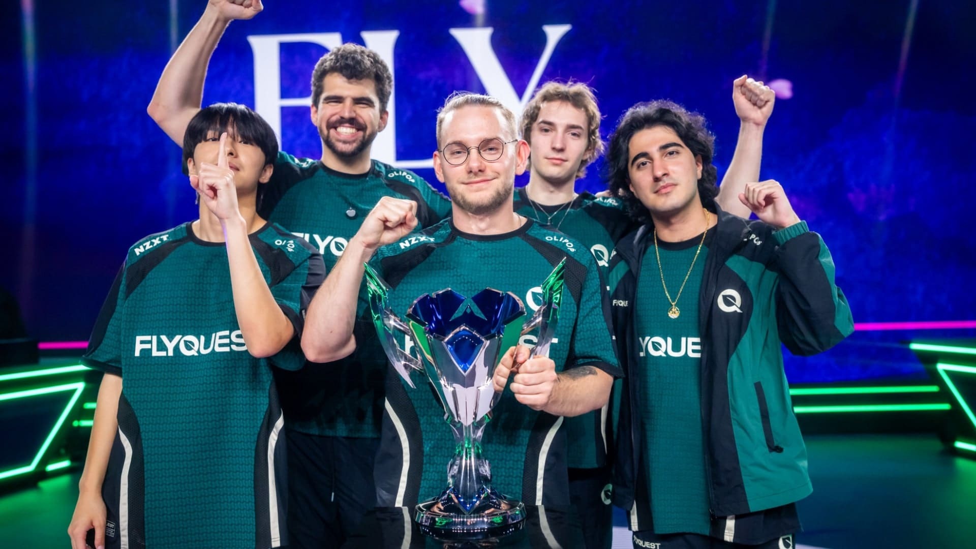 FlyQuest celebrate with trophy