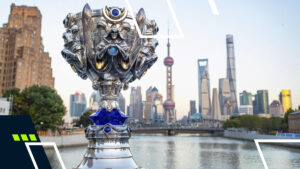 LoL Worlds trophy displayed in front of Shanghai skyline