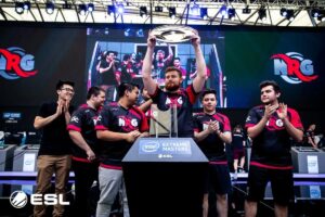 NRG Lifting a Trophy on stage at ESL