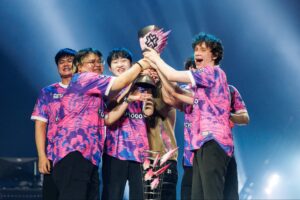 Paper Rex players lifting the VALORANT Masters trophy on stage