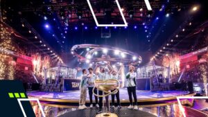 A team holds a trophy triumphantly on an illuminated stage at an esports event. Surrounding them are vibrant lights and fireworks, conveying excitement