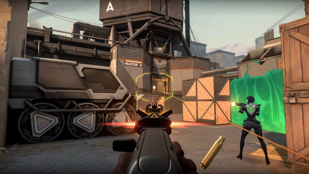 Players engage in a firefight on Bind A site in VALORANT during a competitive match