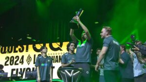 FlyQuest players celebrate their League of Legends LTA 2024 championship victory on stage holding the trophy