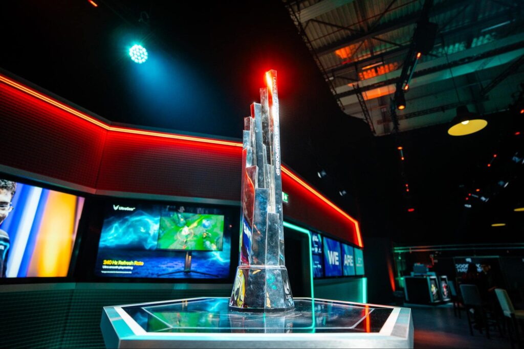 The LEC 2026 Versus championship trophy displayed under stage lights in the tournament arena