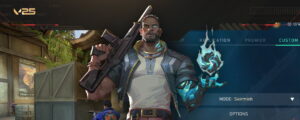 Veto standing in VALORANT’s menu screen holding a rifle and channeling his glowing mutation power