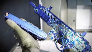 Player inspecting a rifle with a blue mastery camo in Call of Duty: Black Ops 7 showcasing Weapon Prestige rewards