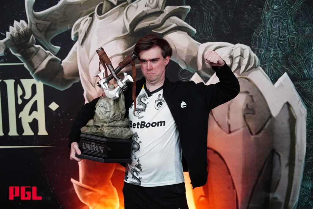 Yaroslav Miposhka Naidenov posing with PGL trophy after winning a major tournament