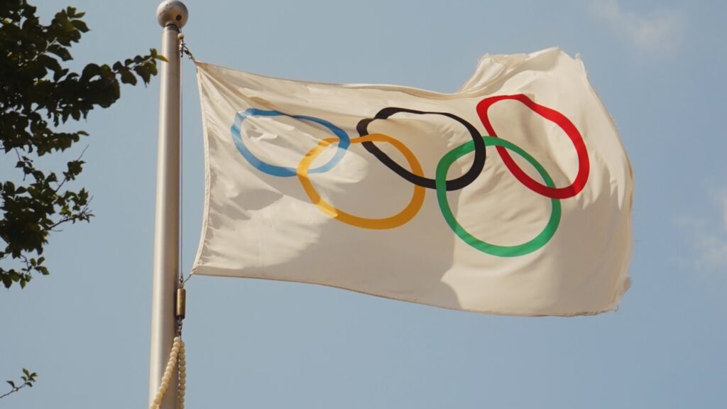 Olympic flag flying in wind