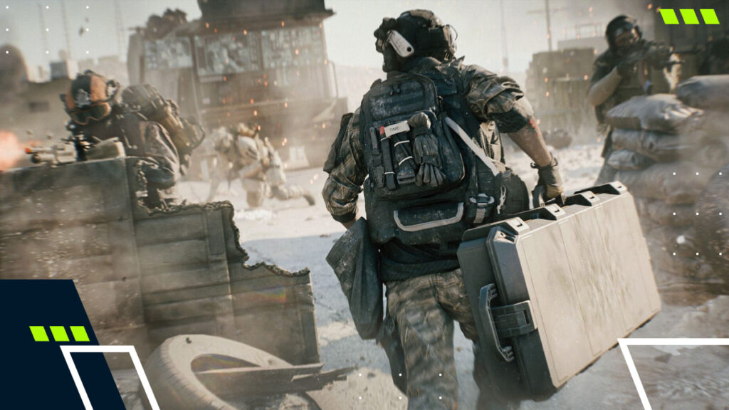 A soldier runs through a chaotic battlefield, holding a briefcase, surrounded by debris and fellow soldiers engaging in combat in Battlefield REDSEC