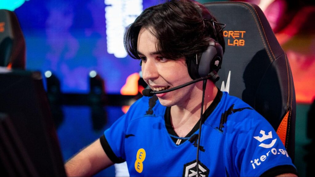 A professional esports player Ismaïl "Isma" Boualem smiles while competing in a live gaming event