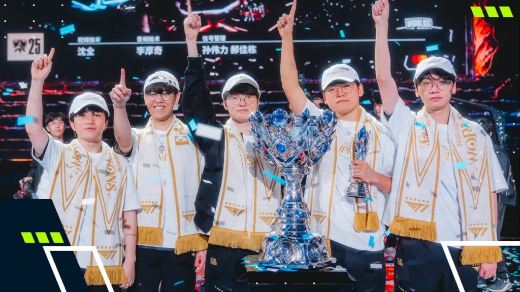 T1 team celebrates Worlds 2025 victory with the Summoner’s Cup on stage