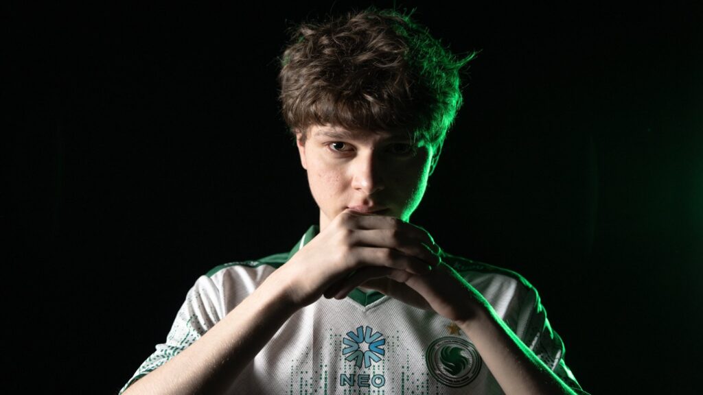 Kyousuke posing for Team Falcons photoshoot