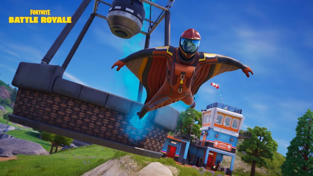 Player gliding in a wingsuit toward the island during a match in Fortnite Battle Royale