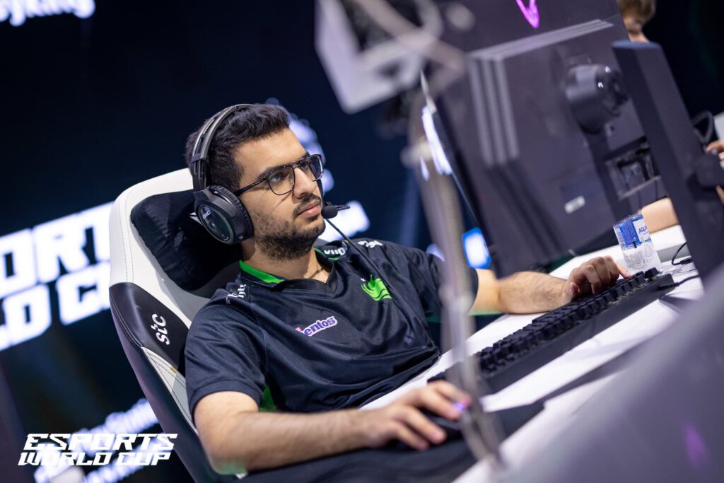Ammar ATF Al-Assaf playing Dota 2 on stage for Team Falcons at a major tournament