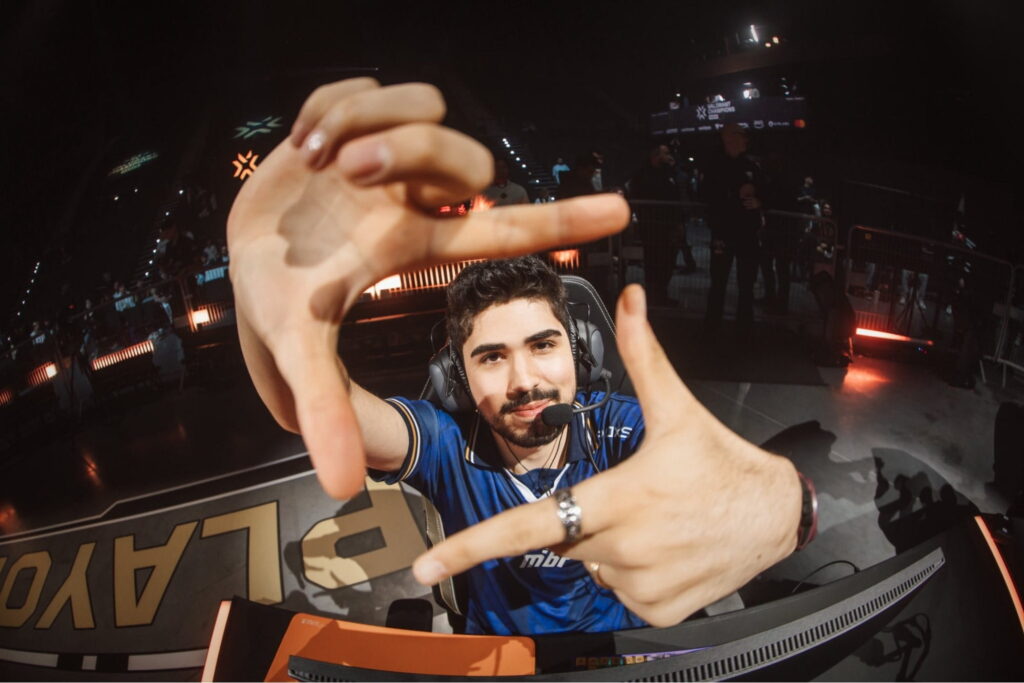 Aspas from MIBR posing on stage during a VALORANT tournament broadcast