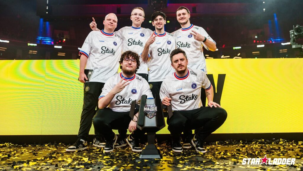 Team Vitality pose with the StarLadder Budapest Major 2025 trophy after winning the CS2 Grand Final