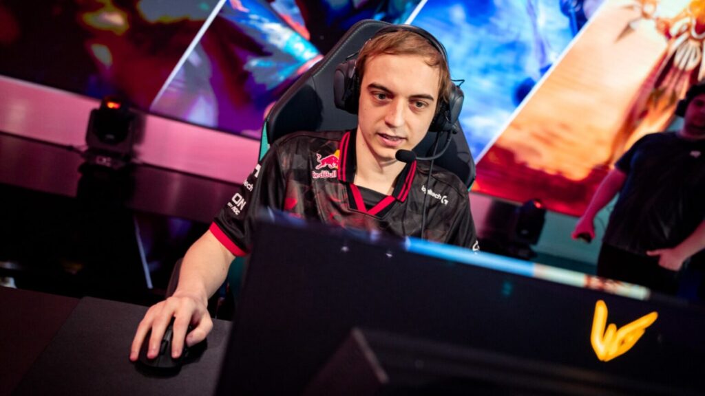 A League of Legends player concentrates on a match while competing on stage in 2025