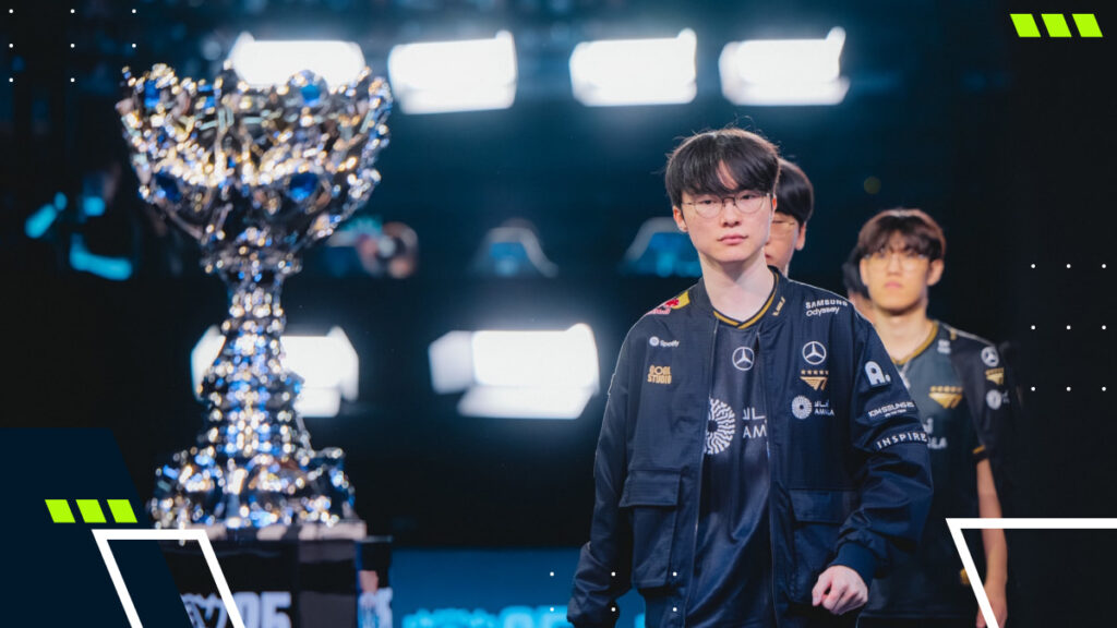 T1 players walk past the Worlds 2025 League of Legends trophy on stage