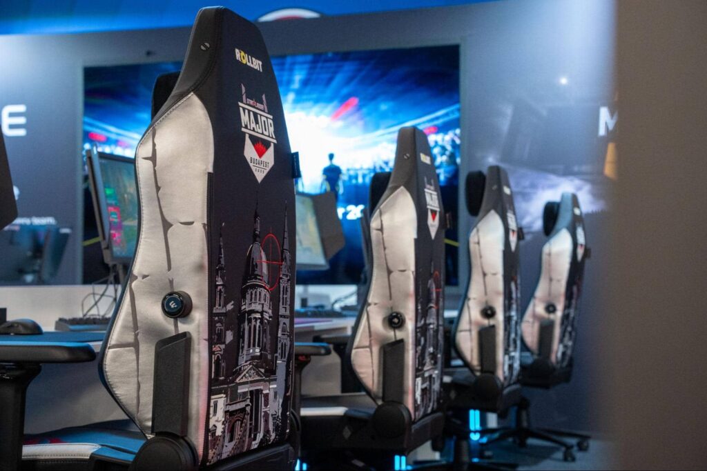 Empty player chairs lined up on the StarLadder Budapest Major stage, awaiting professional Counter-Strike players before competition begins