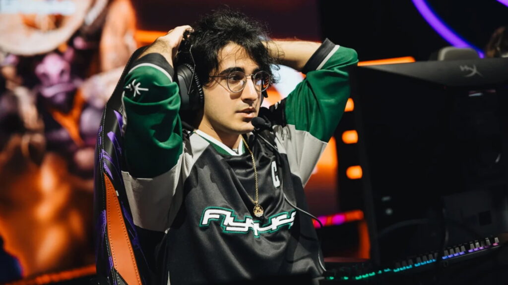 League of Legends ADC reacting on stage after a tense teamfight during an LEC match