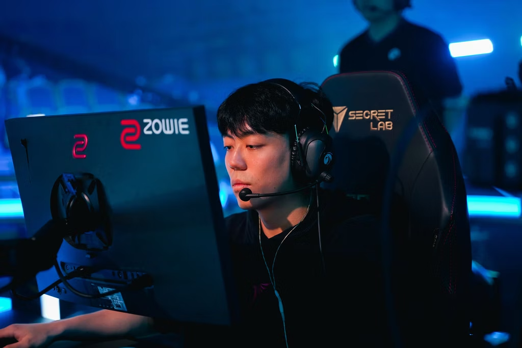 Professional Counter-Strike 2 player competing on stage using ZOWIE esports peripherals