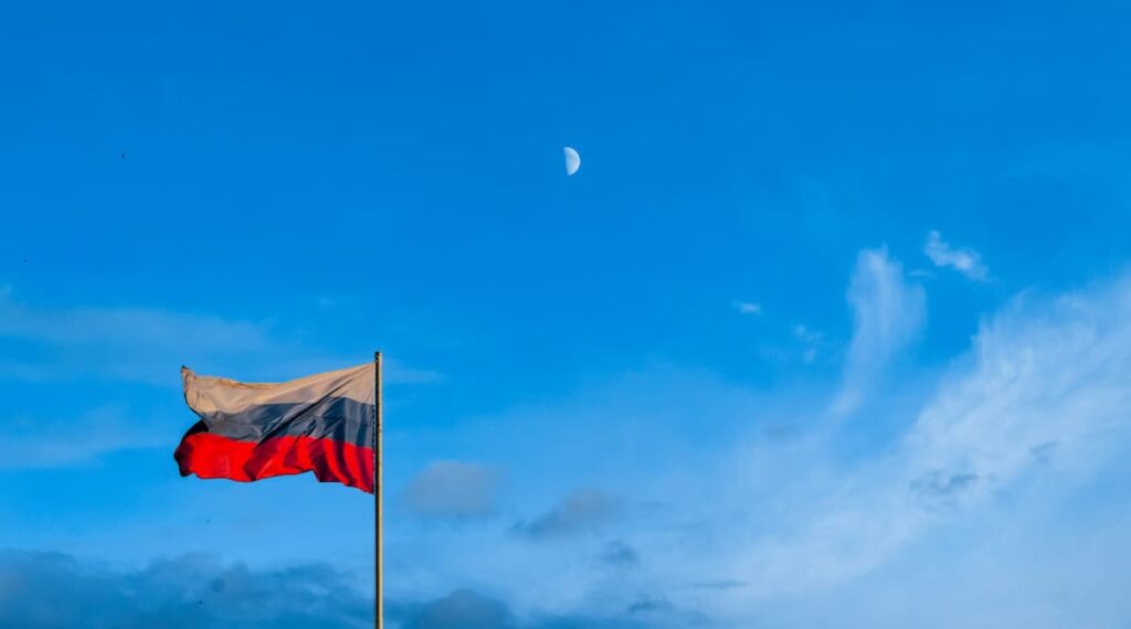 Russia Flag with Sky Background