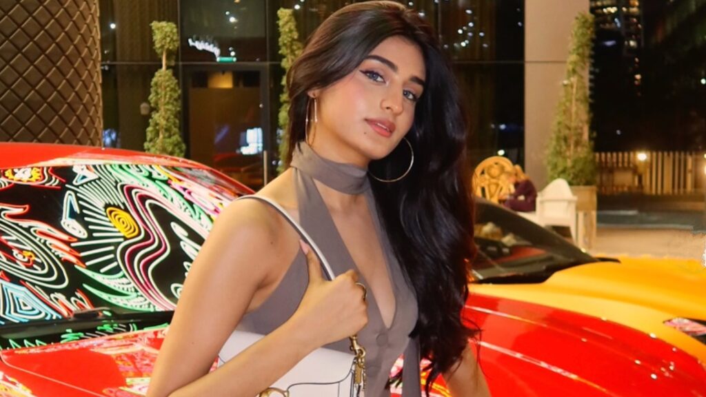 Payal Gaming posing by car in Instagram photo