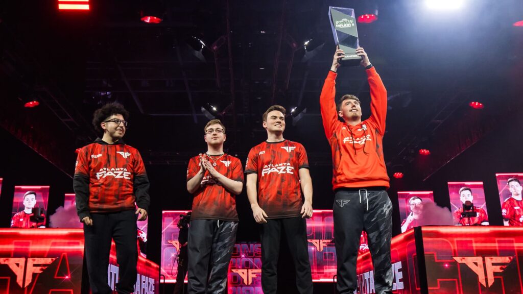 Atlanta FaZe players celebrating on stage with a trophy