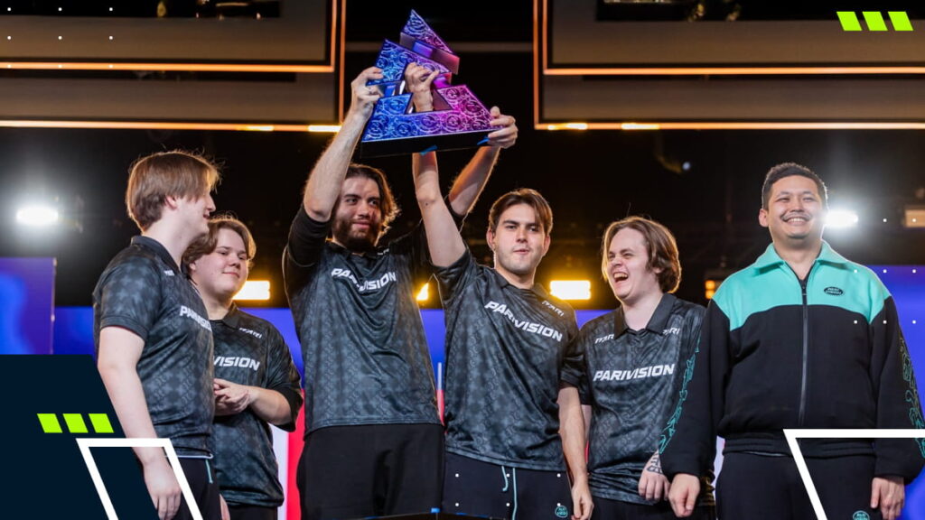 PARIVISION players lift the trophy on stage