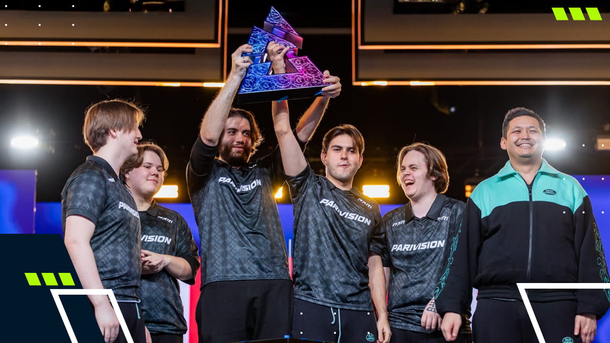 PARIVISION players lift the trophy on stage