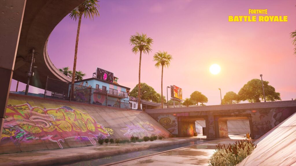 Fortnite Battle Royale skate park area with graffiti walls and palm trees at sunset