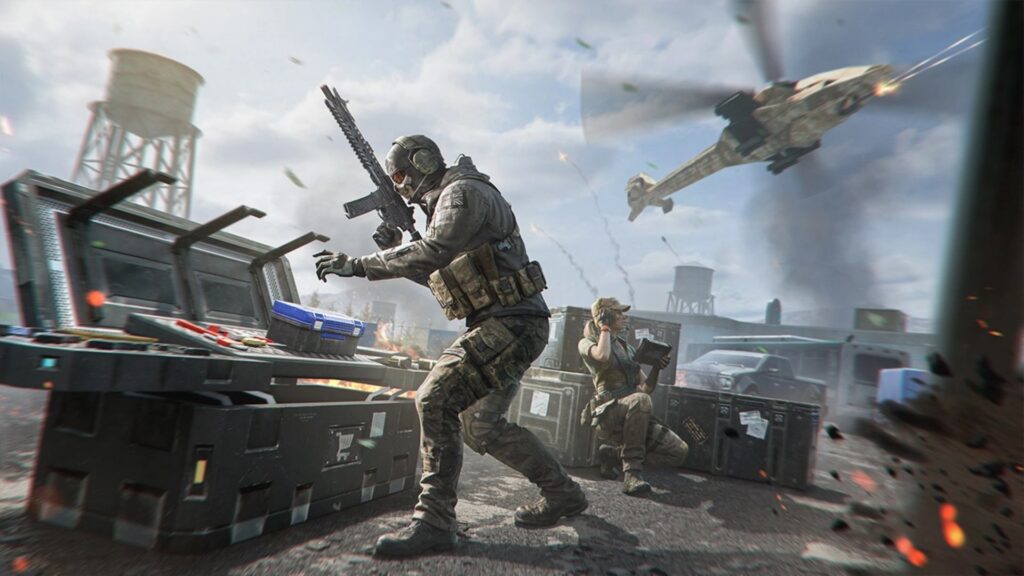 Call of Duty Mobile soldiers in tactical gear take cover behind supply crates while a helicopter flies overhead, illustrating in-game action related to COD Mobile error 74031 issues.