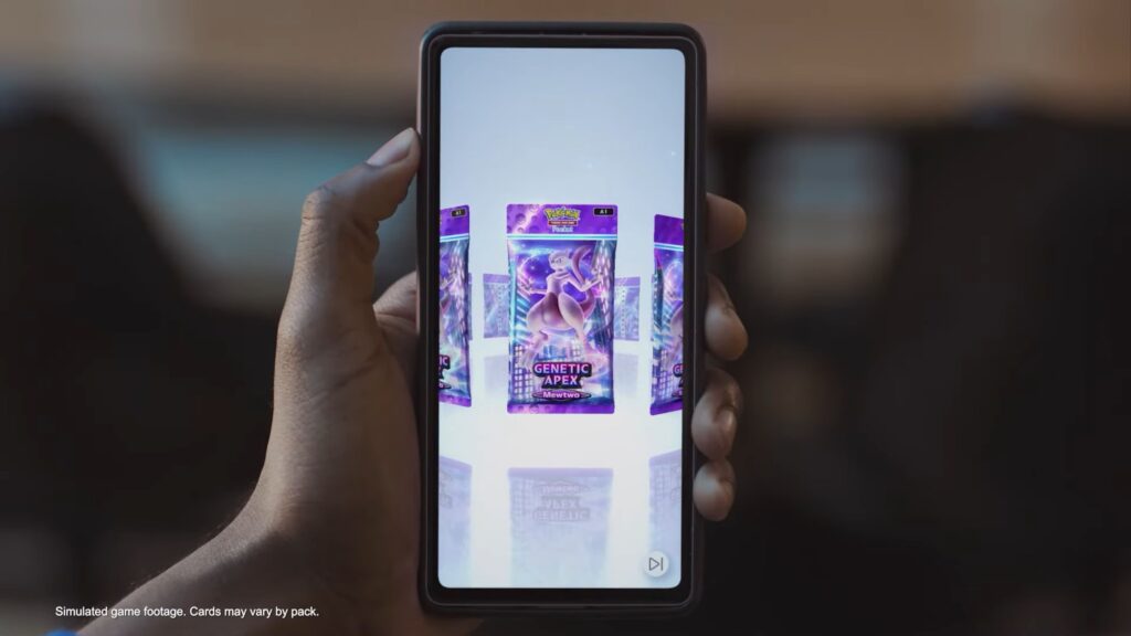 hand holding a phone playing pokemon tcg pocket